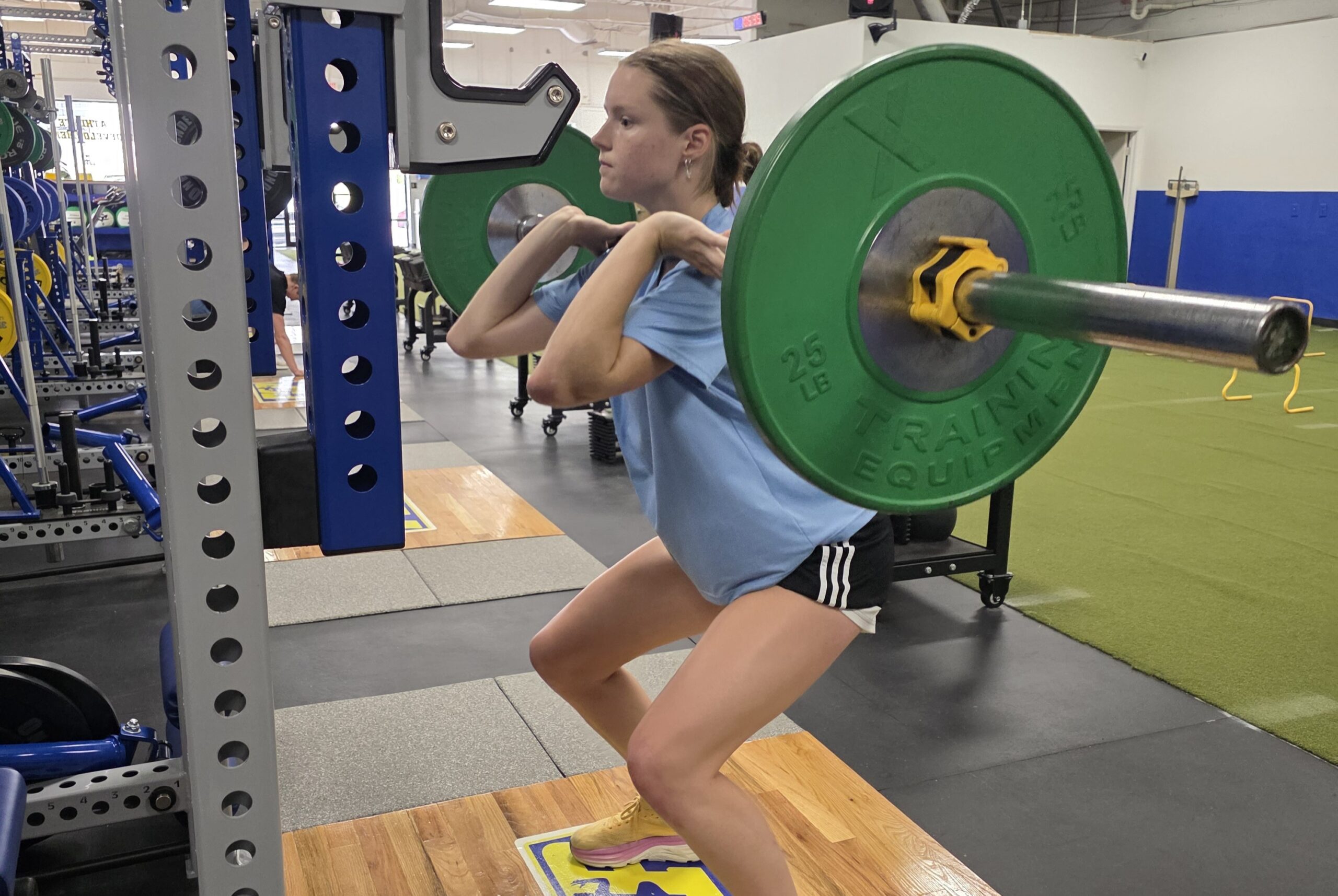 Premier sports performance training with female yout athlete